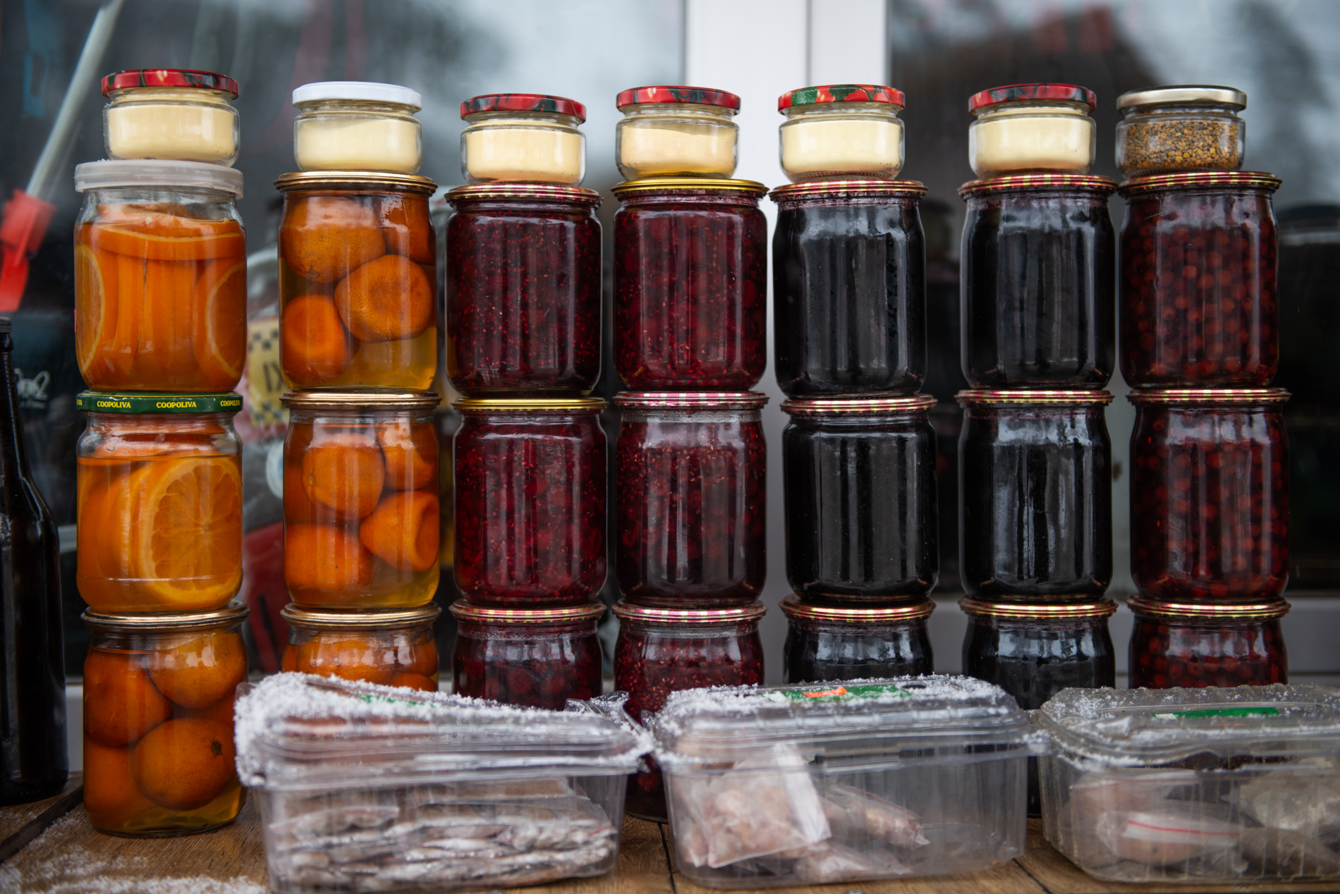 Naira Kurmashvili has been selling Bakuriani delicacies for the last thirty years. One jar costs ₾10 [$3], and her income depends on how many of those she’ll sell. Photo: Tamuna Chkareuli/OC Media.